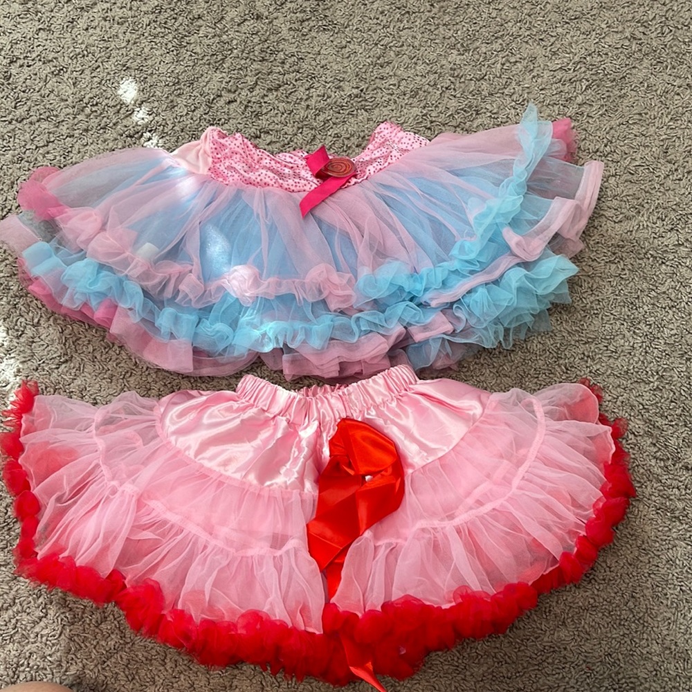 Red, pink frilly tutu skirt for girls - no size listed but has adjustable waist